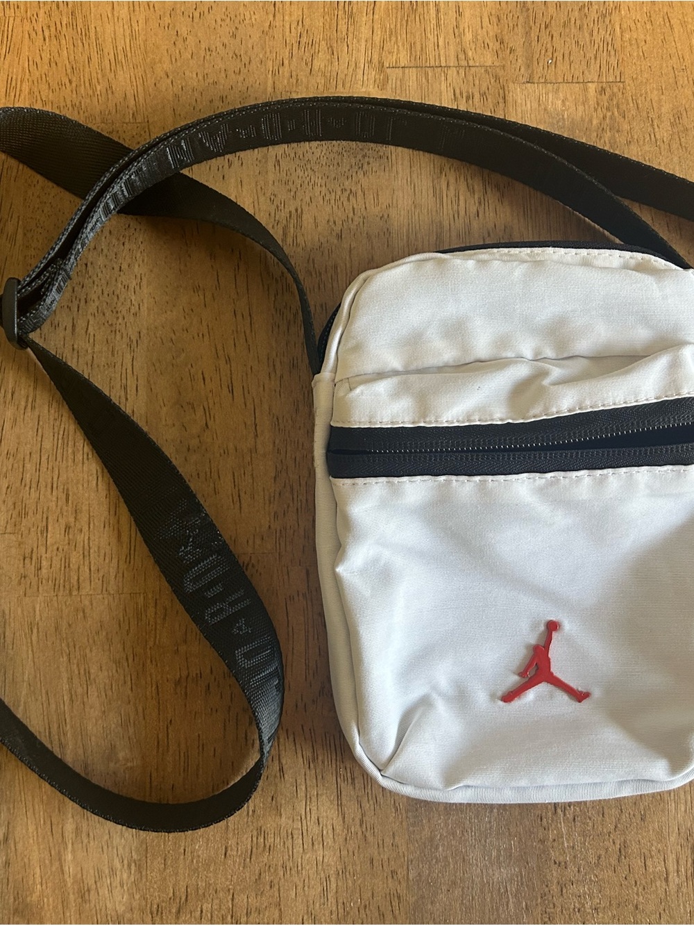 Nike White Crossbody Belt Bag with Red Jumpman and Black Strap